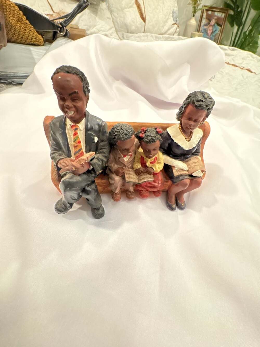 UTI African American Family Sitting on Church Pew Resin Figurine
